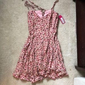 Brand new with tags. Cute sun dress!